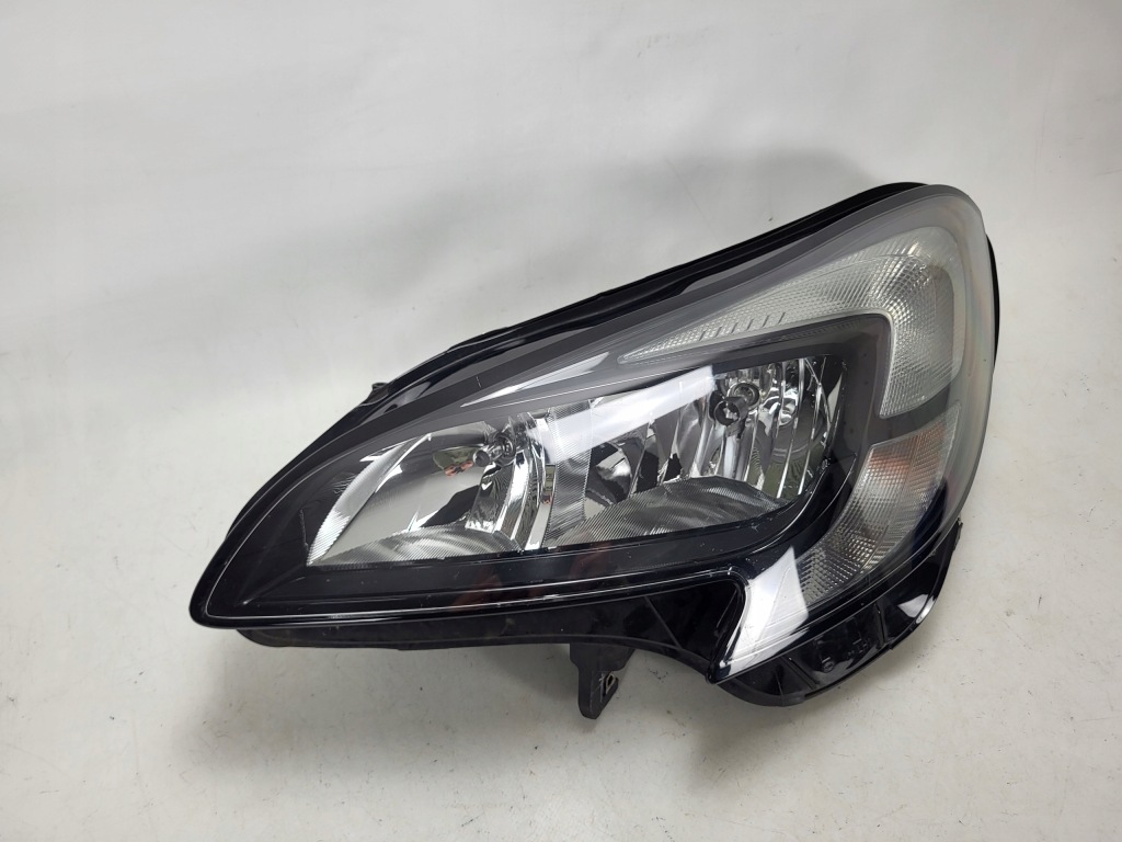 OPEL CORSA E lampa przód przednia lewa 13381335