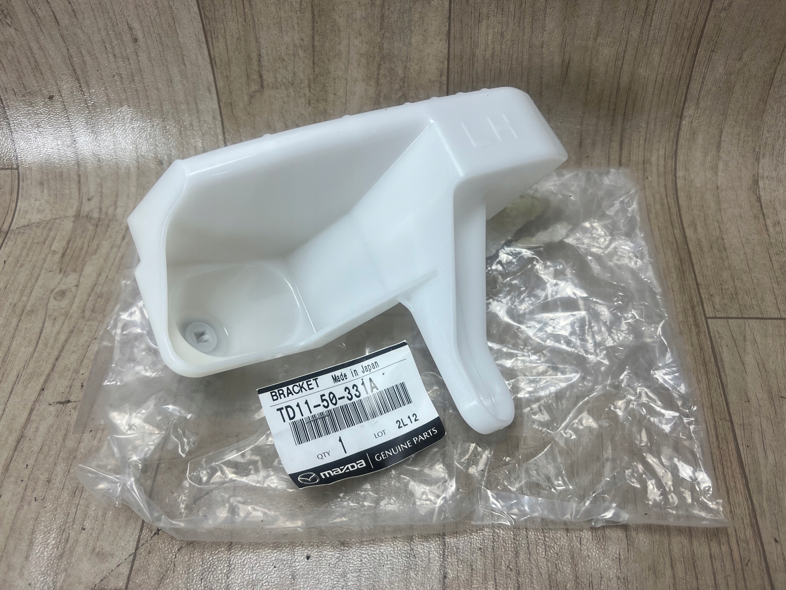 MAZDA CX9 CX-9 TB ślizg mocowanie zderzaka tył tylny lewy TD1150331A