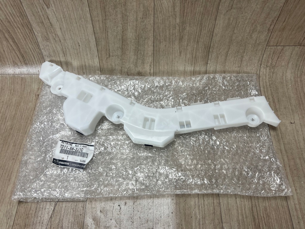 MAZDA CX9 CX-9 TB ślizg mocowanie zderzaka tył tylny lewy TD11502J1C